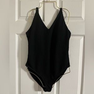Black one piece ribbed fabric